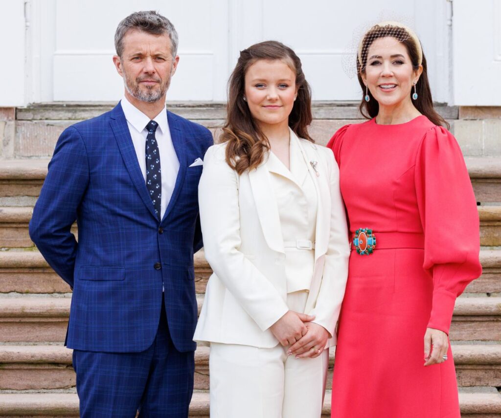 Princess Isabella of Denmark on her confirmation day in 2022 alongside both parents, King Frederik X and Queen Mary.