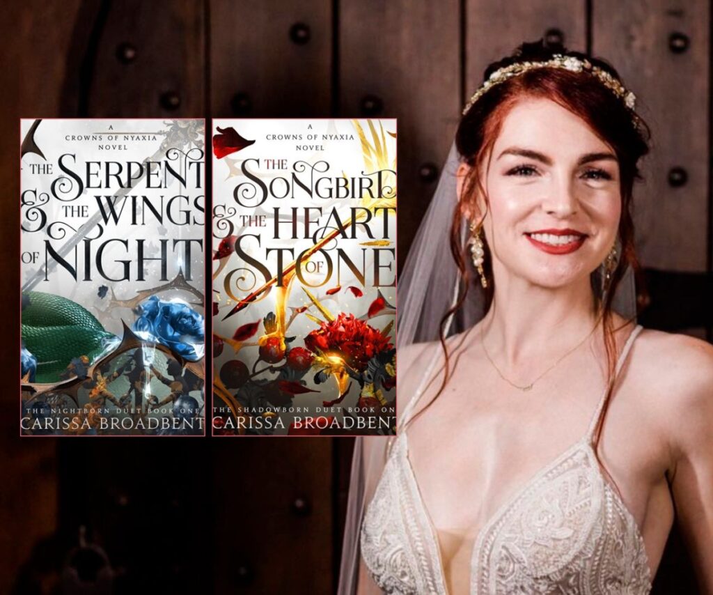 Author Carissa Broadbent smiles wearing a wedding gown with her two books The Serpent & The Wings of Night and The Songbird & The Heart of Stone