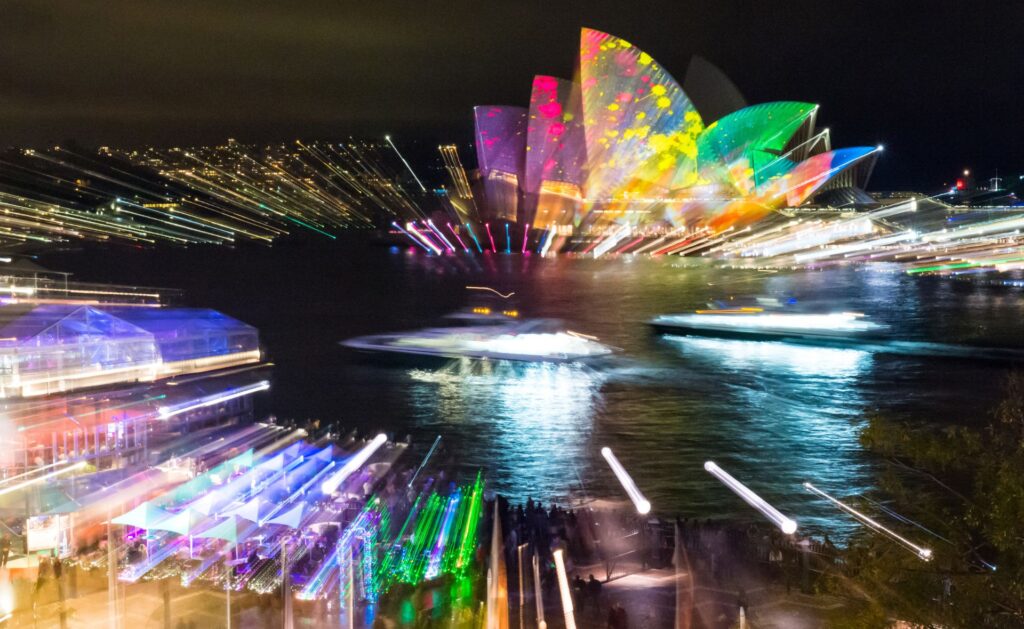 vibrant colours and light adorn the Opera House and Sydney Harbour for Vivid