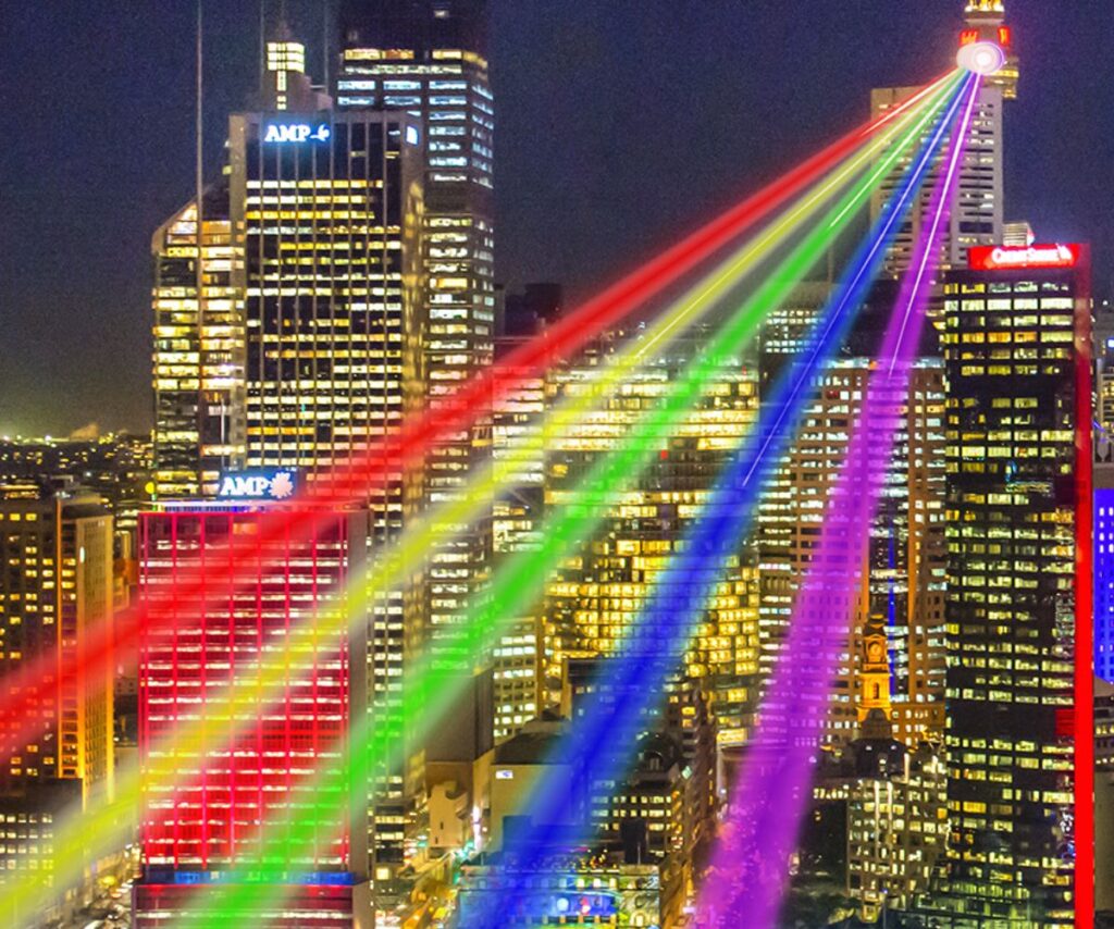 Global Rainbow beams red, yellow, green, blue and violet lasers from iconic Sydney Tower Eye.