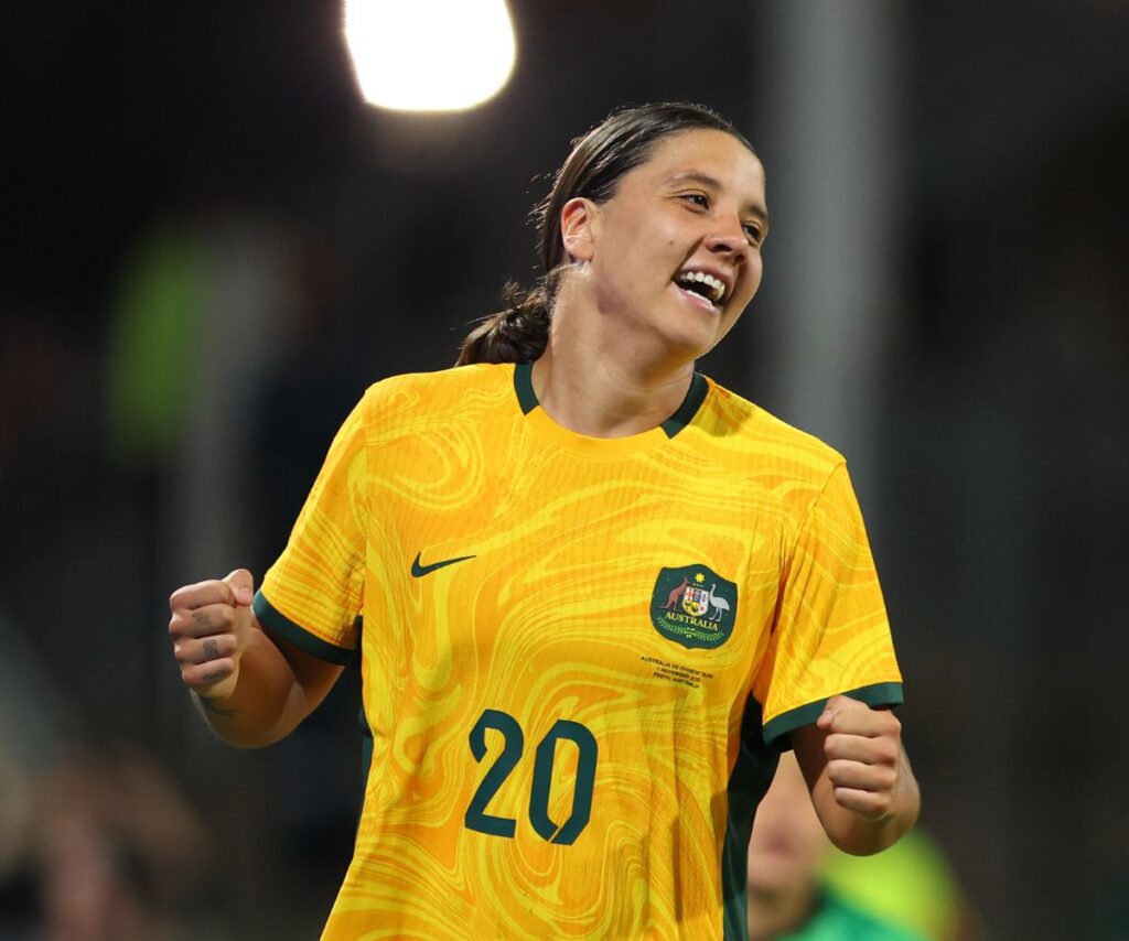 Sam Kerr smiles during game