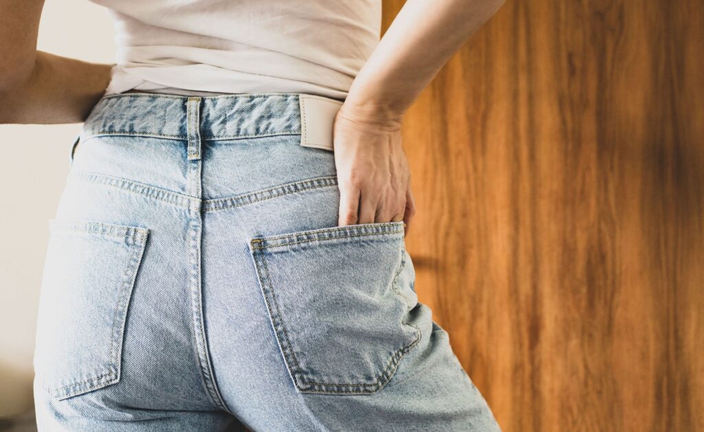 Woman's backside in high waisted jeans