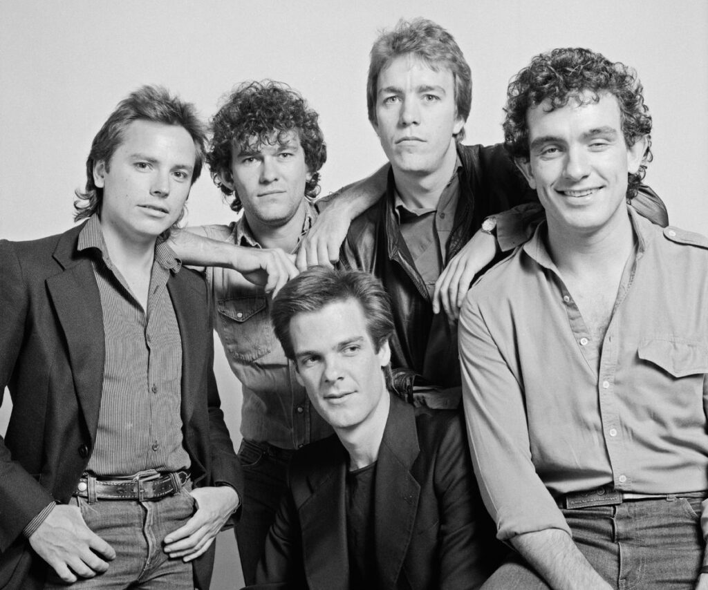 retro black and white image of Cold Chisel at the height of their fame