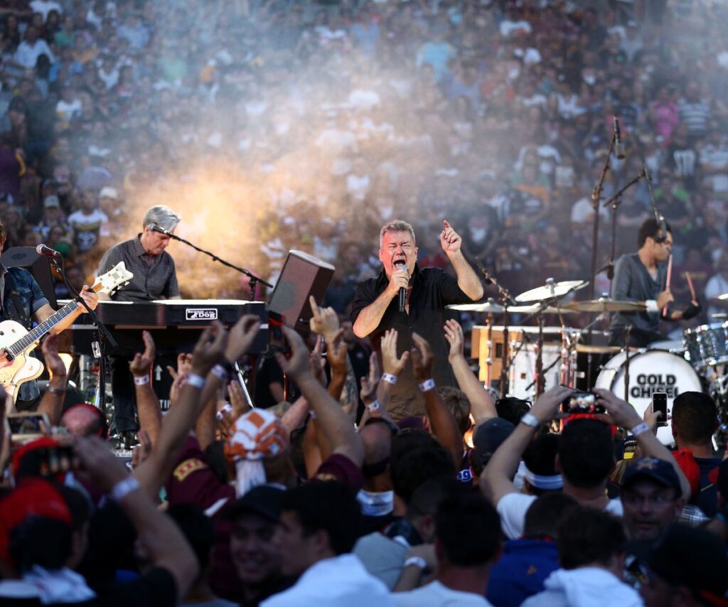 Cold Chisel plays for a live audience with vocalist Jimmy Barnes singing his heart out
