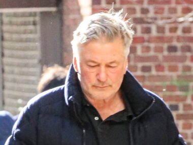 Alec Baldwin looks down, seemingly upset