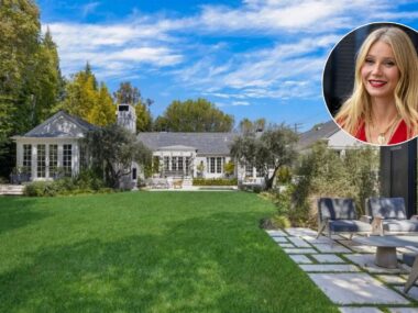 Gwyneth Paltrow in bright red lipstick and red top on Brentwood house she's selling