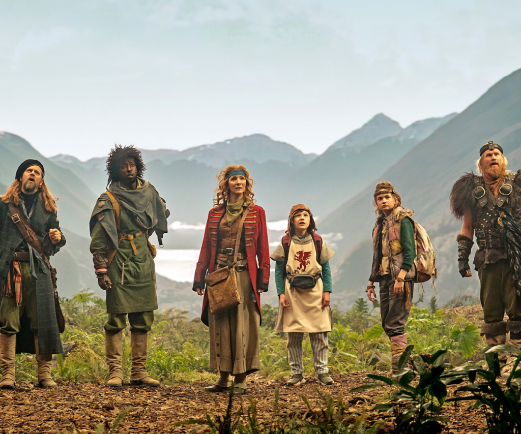 A group of rag-tag time travelling thieves with misty mountains in the background