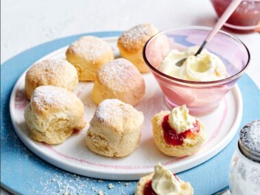 Delicious air fryer scone slathered in jam and cream