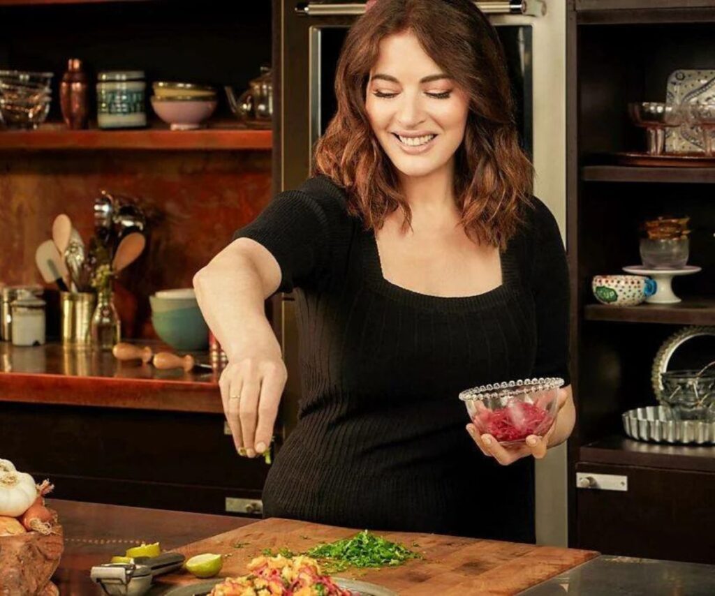 Nigella Lawson, wrinkle-free, cooking in the kitchen