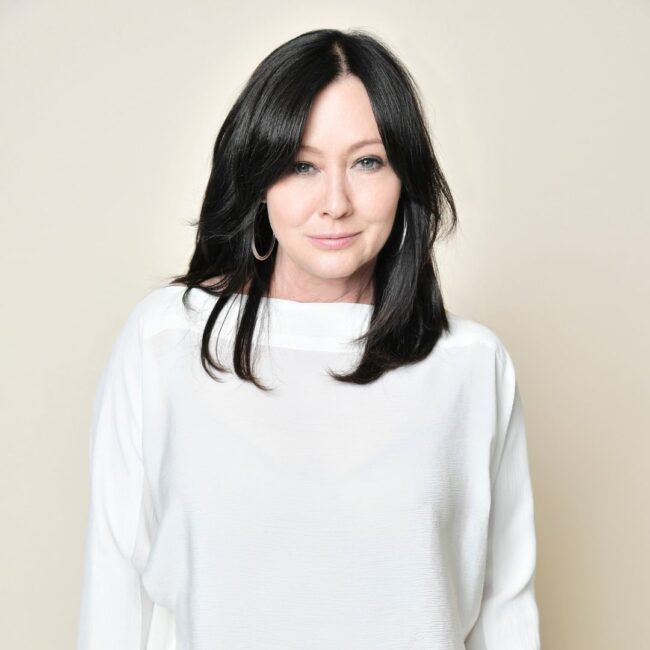 Shannen Doherty is all white looking ahead. she has died