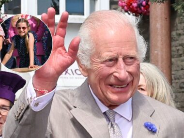 King Charles waves wearing a friendship bracelet likely from Princess Charlotte