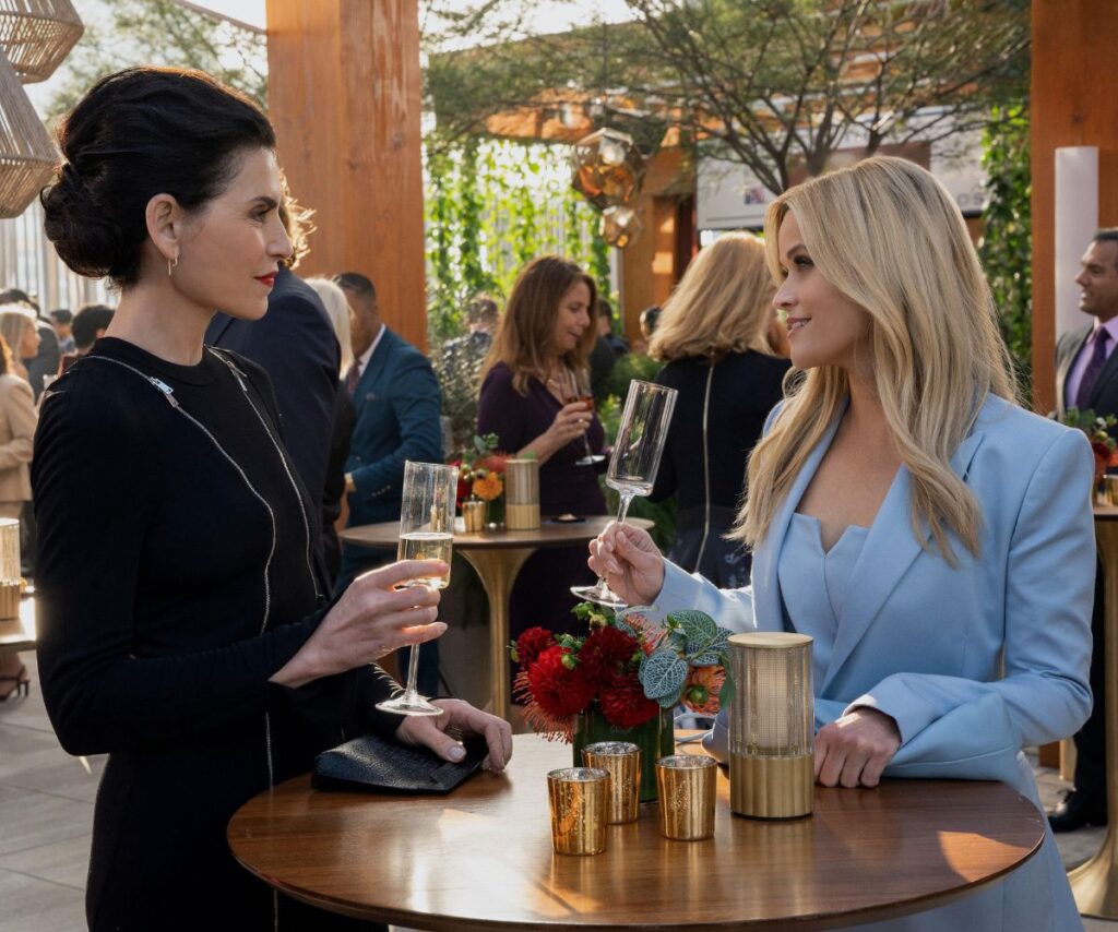 Morning Show Reese Witherspoon and Julianna Margulies in character at a restaurant