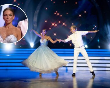 Nadia Bartel dancing her elimination dance on Dancing With The Stars in an ombre blue to white gown