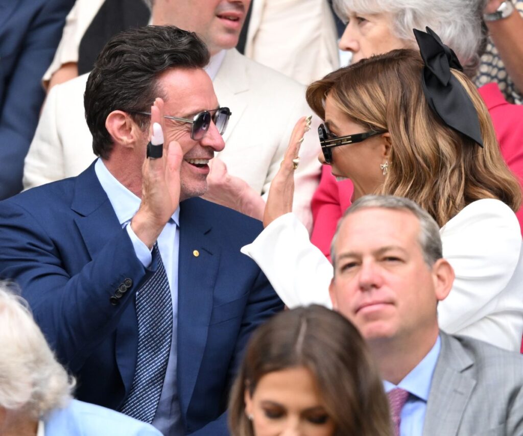 Hugh and Kate were seen high-fiving each other and barely watched the match! 