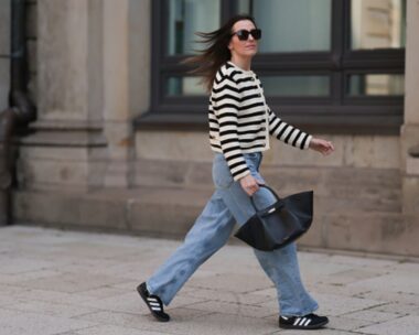 woman walking wearing sneakers