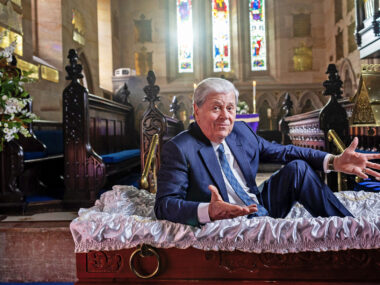 Ray Martin sits in a coffin to promote his new show Ray Martin: The Last Goodbye