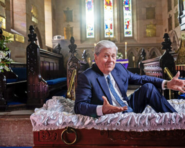 Ray Martin sits in a coffin to promote his new show Ray Martin: The Last Goodbye