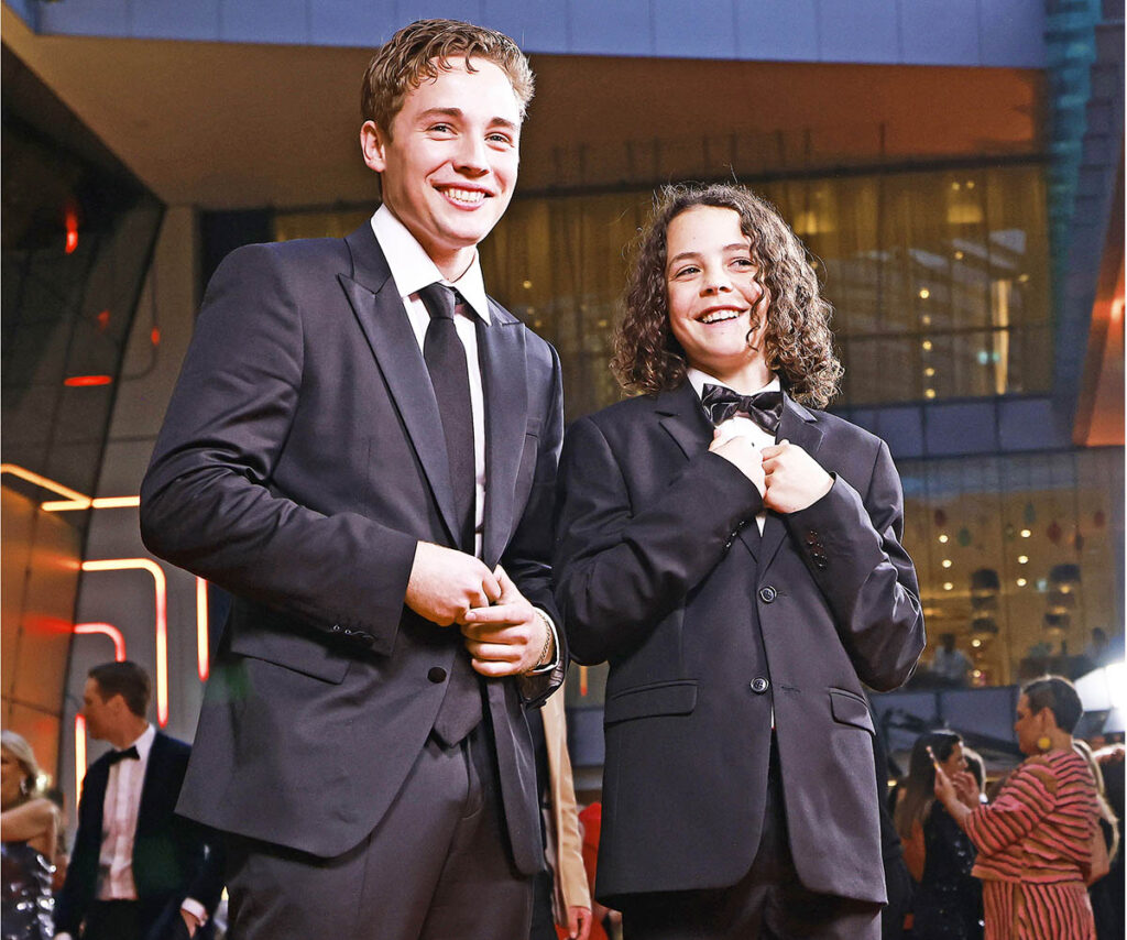 Lee Tiger Halley and Felix Cameron the Logies stage in suits