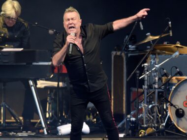 Rock legend Jimmy Barnes “tethered to a drip 24 hours a day” as he recovers from hip surgery at home