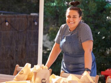 An image of a smiling Tina, the barista from The Block.