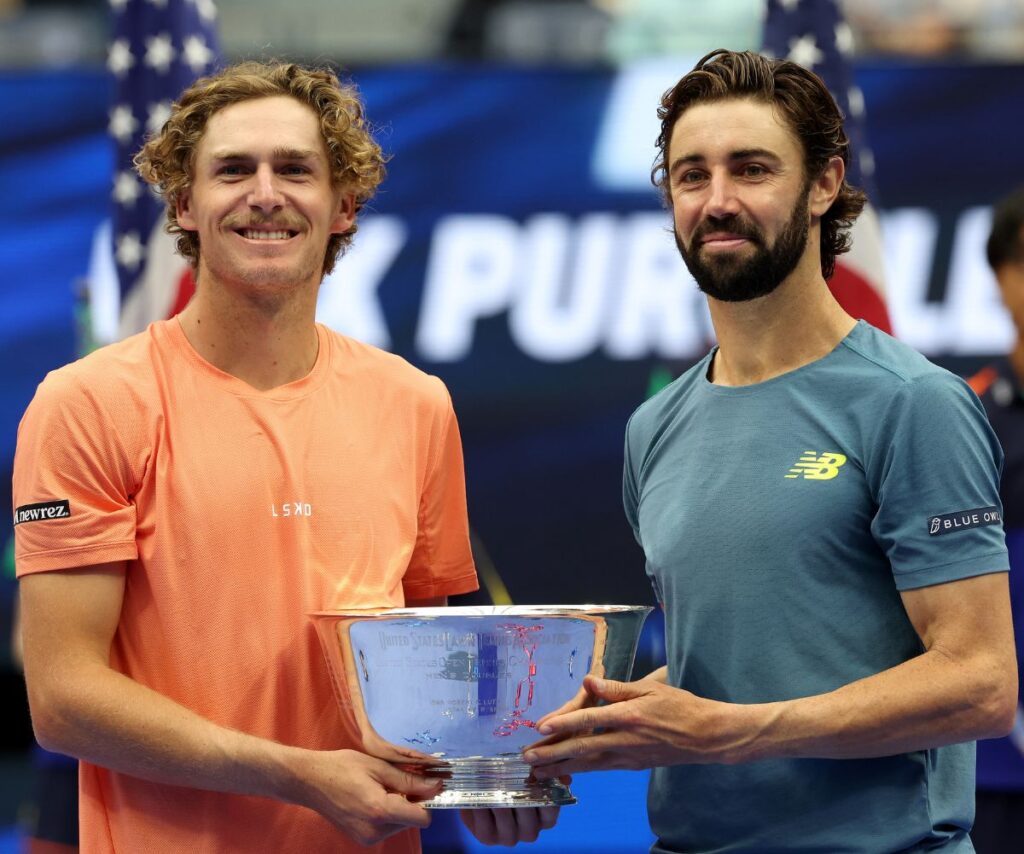 Jordan Thompson and Max Purcell with their trophy after winning the 2024 US Open doubles title.