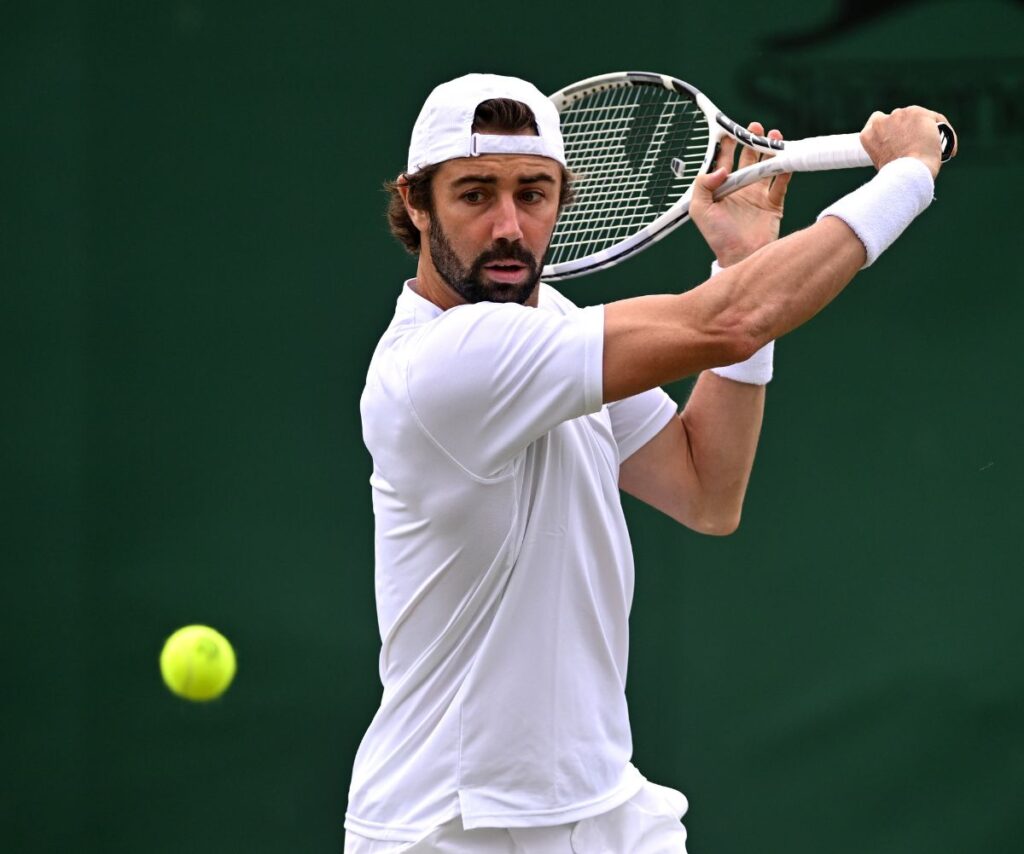 Jordan Thompson playing tennis.