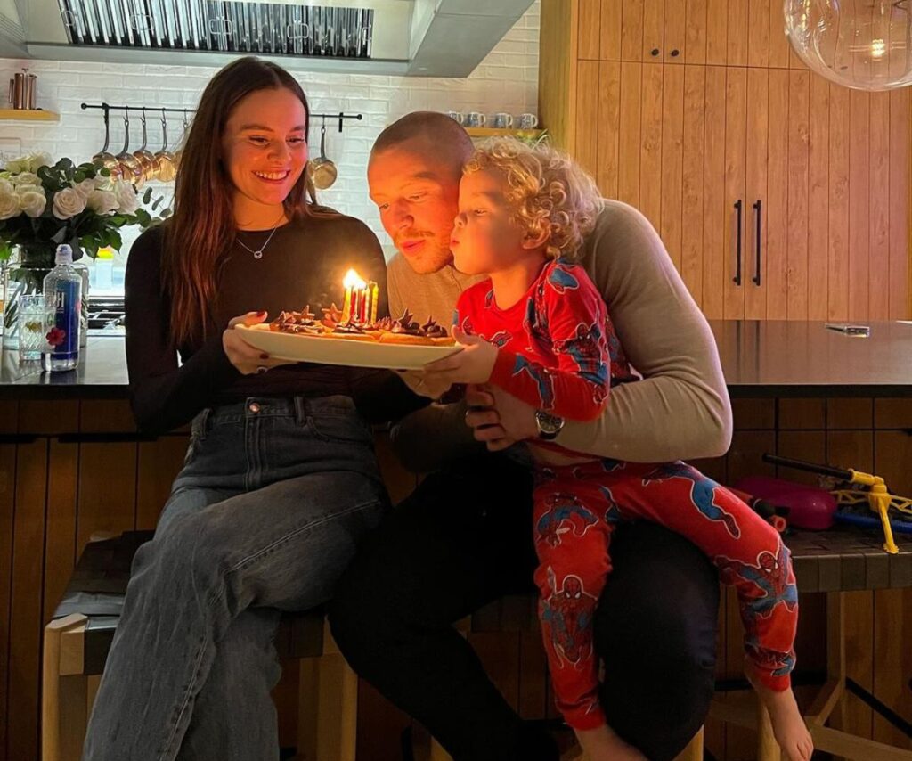 Adam Peaty with son George and partner Holly Ramsay.