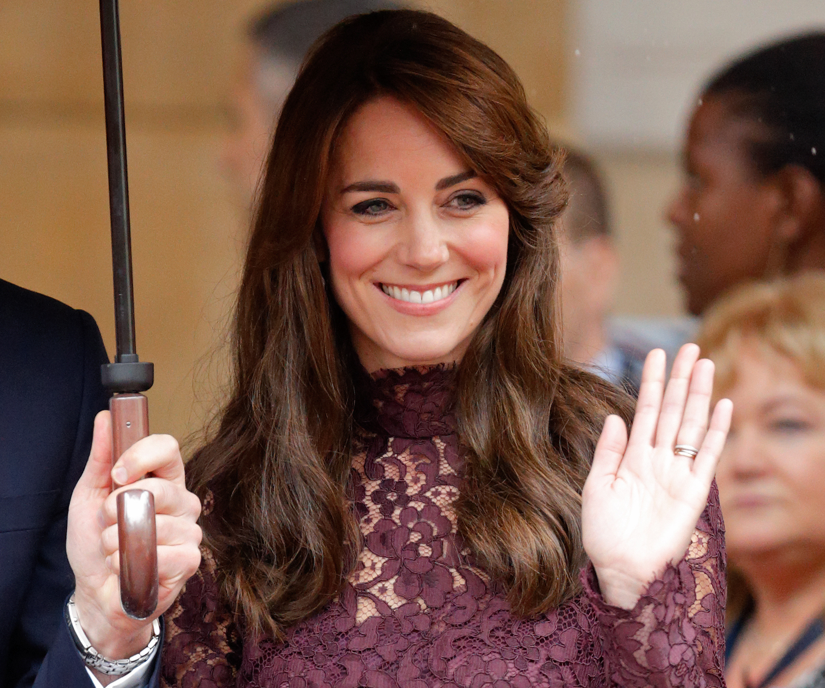 Duchess Kate wears purple lace Dolce & Gabbana dress