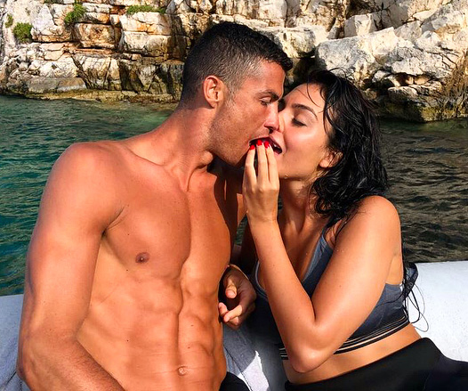 Georgina Rodriguez sizzles in red lingerie as Cristiano Ronaldo's  girlfriend poses next to Christmas tree
