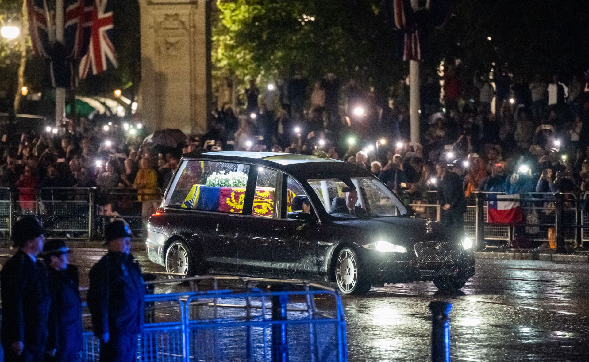 The royals reunite as The Queen’s coffin arrives at Buckingham Palace to a crowd of thousands