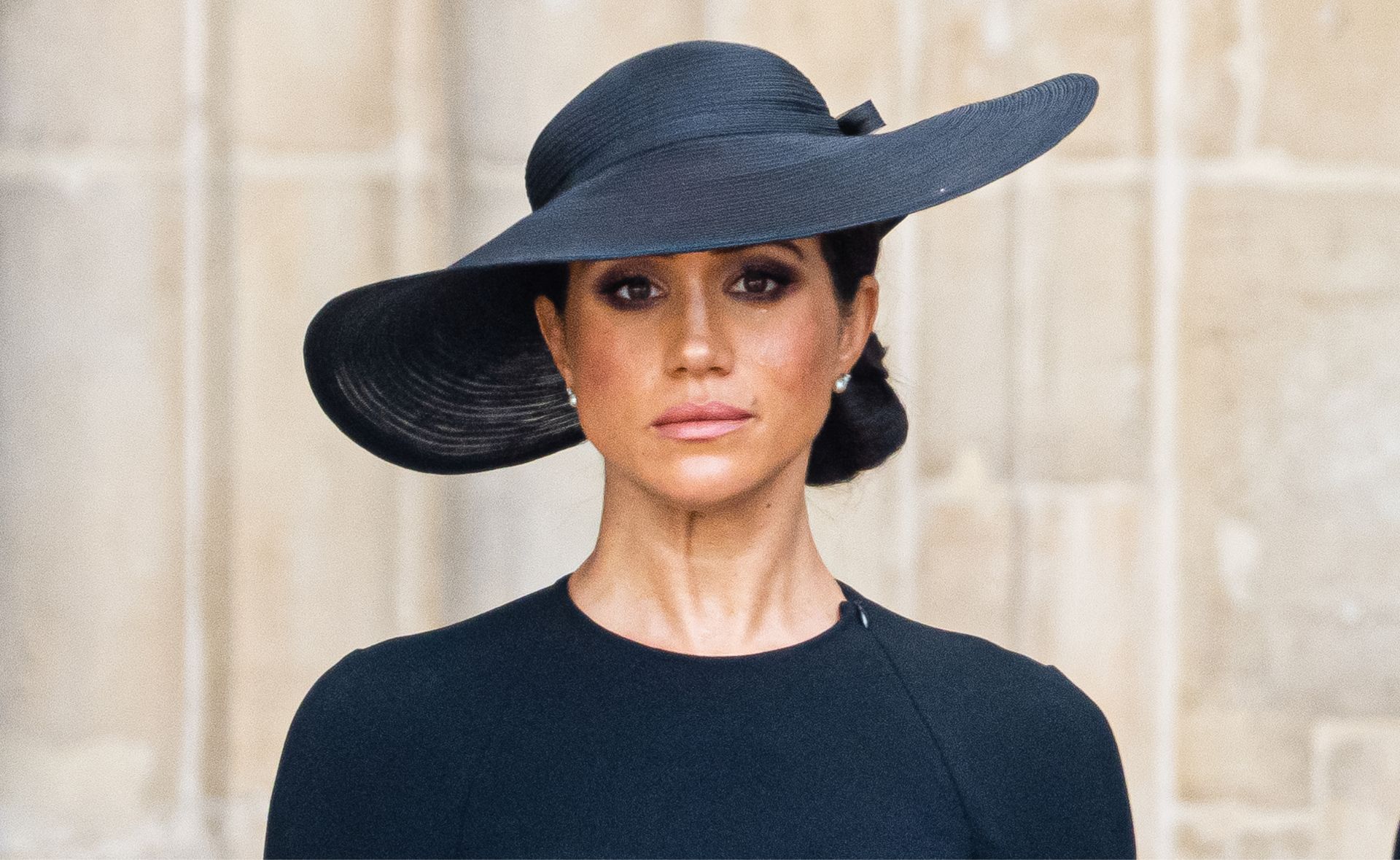 Meghan Markle seen in tears as she watched the Queen’s procession