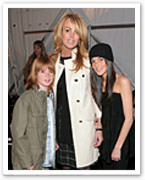 Dina Lohan cashes in on her kids