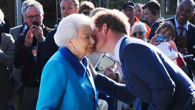 Prince Harry's welcome home kiss for Queen